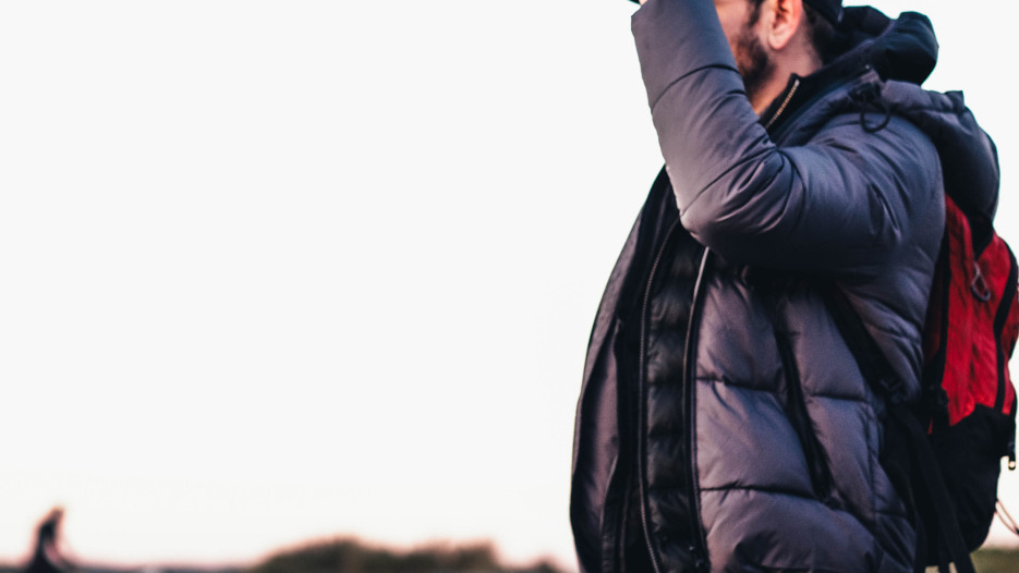 man hiking in jacket