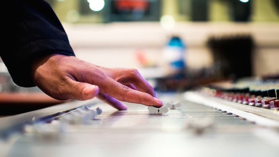 hand on mixing board