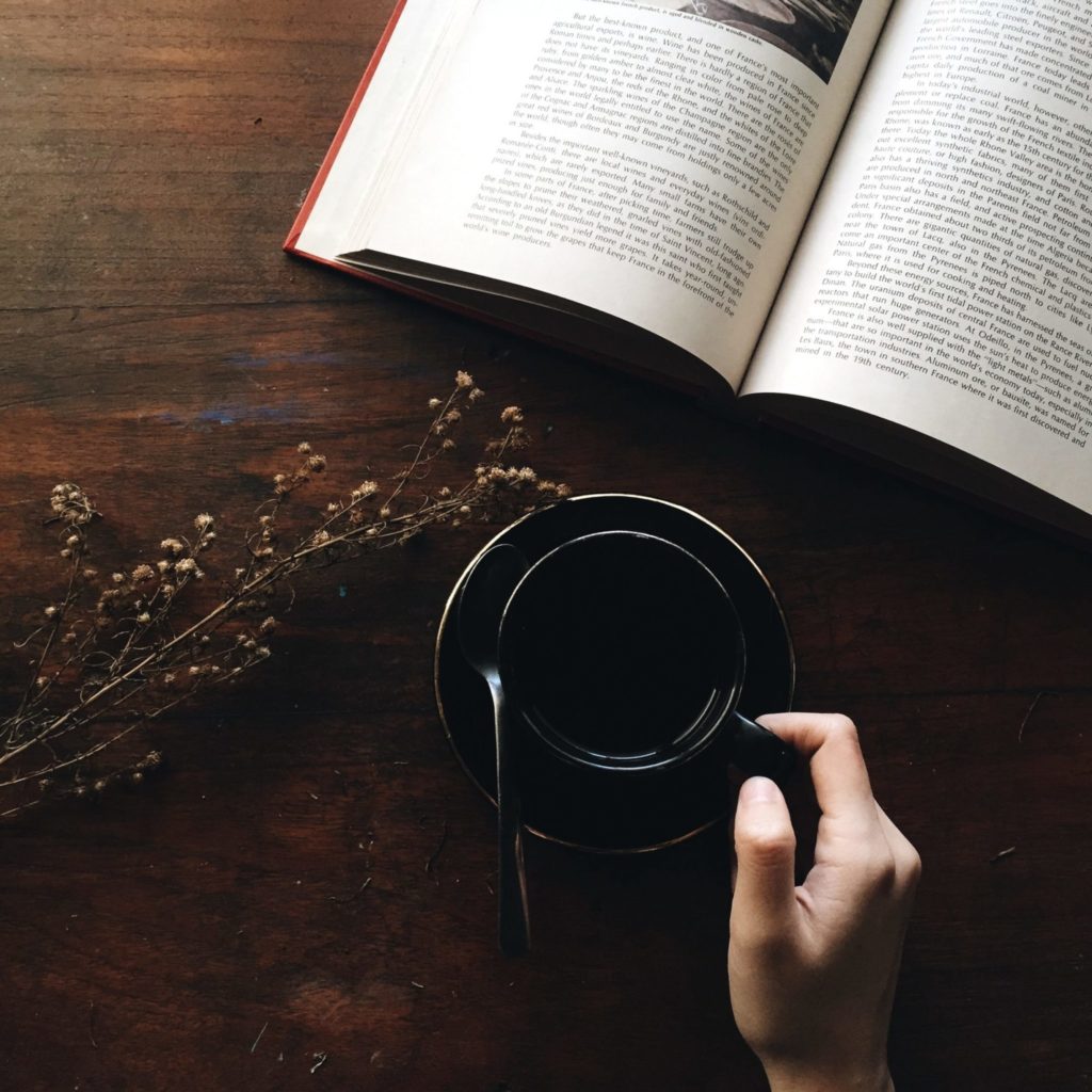 hand on a cup of tea