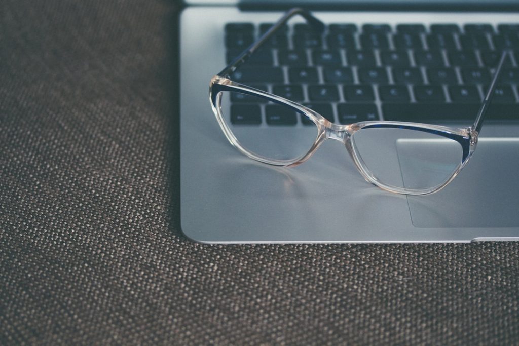 glasses on laptop